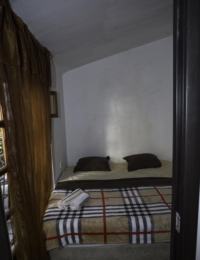 Patio Hostel Тбилиси Стая снимка